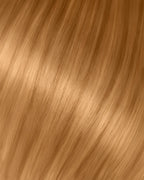A swatch of cool blonde hair extension, showcasing its long, silky strands and vibrant color.
