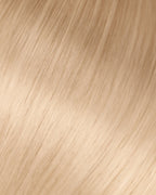 A swatch of ash blonde hair extensions, showcasing a soft and natural sheen.