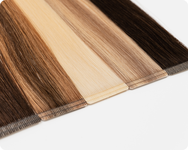 A layout of tape-in hair extension samples in smooth, straight colored shades from dark brown to platinum blonde.