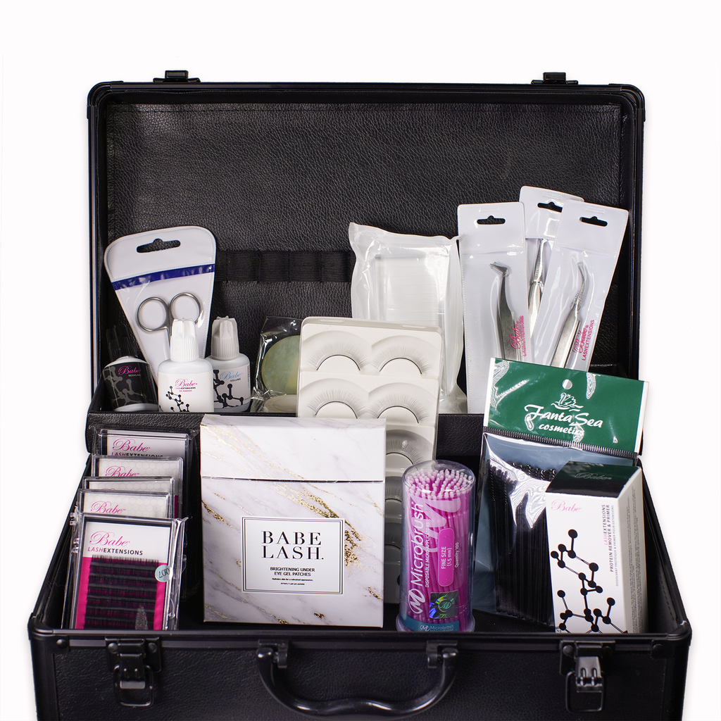 Beauty products neatly organized in a black case, including hair extension essentials.